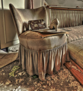 old armchair in an abandoned house old armchair in an abandoned house